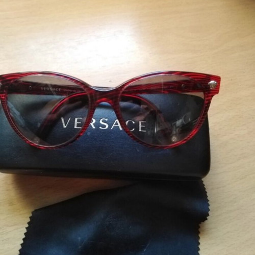 Versace women's sunglasses like new, dark burgundy frame