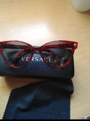 Versace women's sunglasses like new, dark burgundy frame