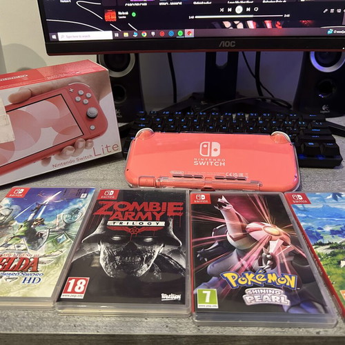 Nintendo Switch Lite κονσόλα σαν καινούργια με 4 παιχνίδια, 128GB αποθηκευτικό χώρο και θήκη
