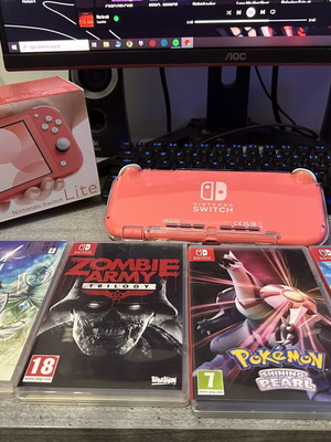 Nintendo Switch Lite κονσόλα σαν καινούργια με 4 παιχνίδια, 128GB αποθηκευτικό χώρο και θήκη