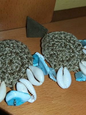 Knitted earrings with shells