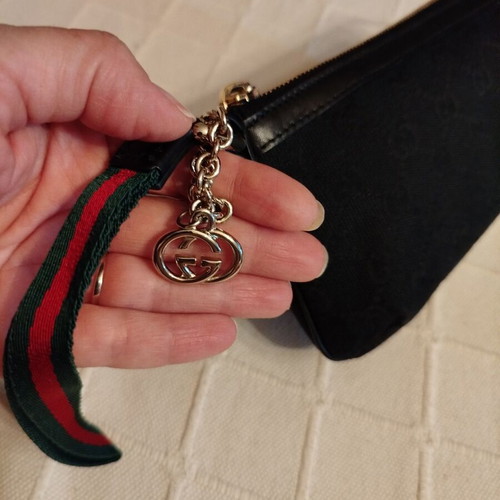 Gucci fabric wrist pouch like new, black