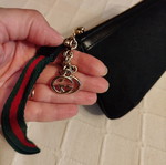 Gucci fabric wrist pouch like new, black