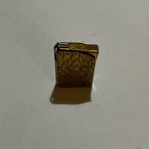 Gold lighter used with damages, not working