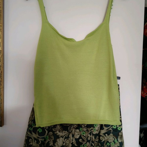 Knitted top used green lime with green pearls, size S