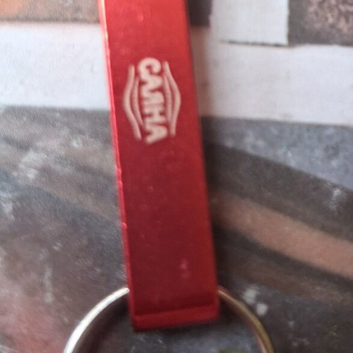 Collector metal keychain bottle opener like new, red