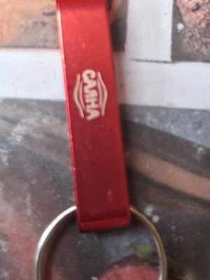 Collector metal keychain bottle opener like new, red