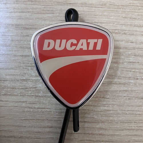Ducati Official metal keychain with red and white enamel shield design