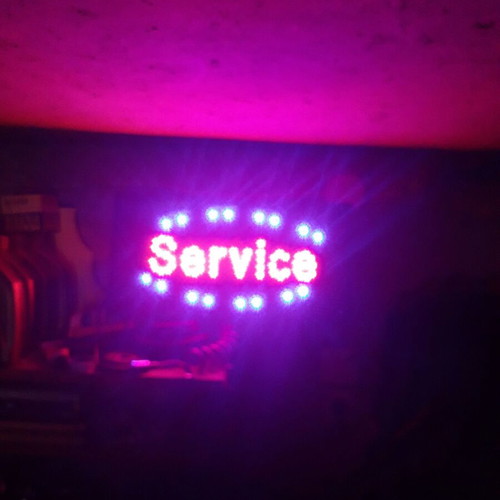 Lighted sign new with moving blue and fixed red LED lights, 50cm