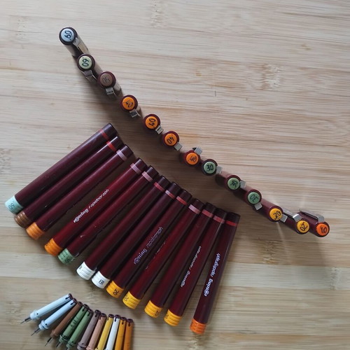 Rotring rapidographs used, set with 11 tips, rings, caps, and bodies