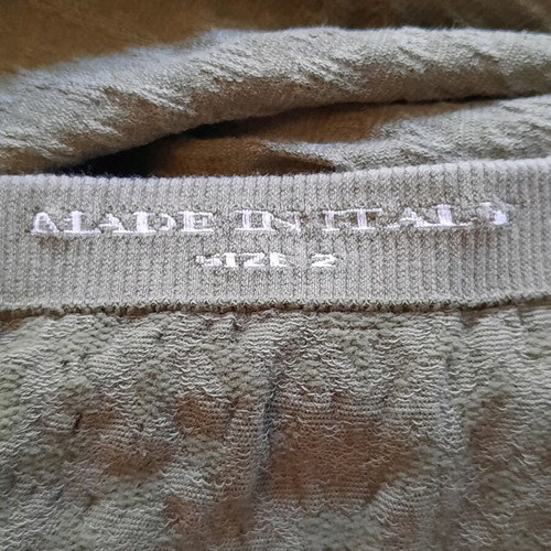 Niederberger Midi skirt new, khaki with embossed texture and knitted motif