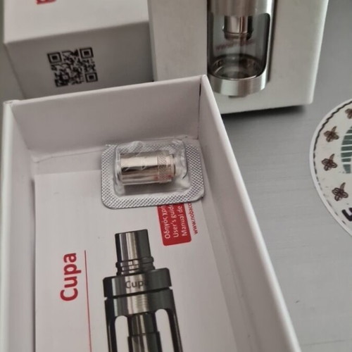 Nobacco Cupa electronic cigarette atomizer used, silver stainless steel