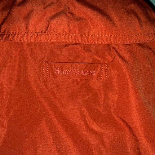 Henry Cottons red lightweight jacket used with detachable hood