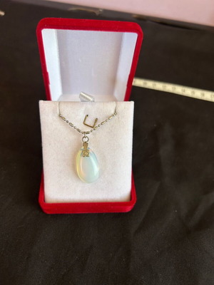 Silver pendant with white-turquoise stone like new