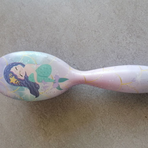 Children's hairbrush with mermaid used