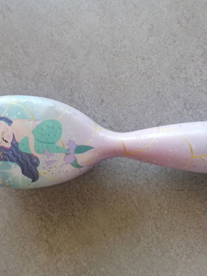 Children's hairbrush with mermaid used