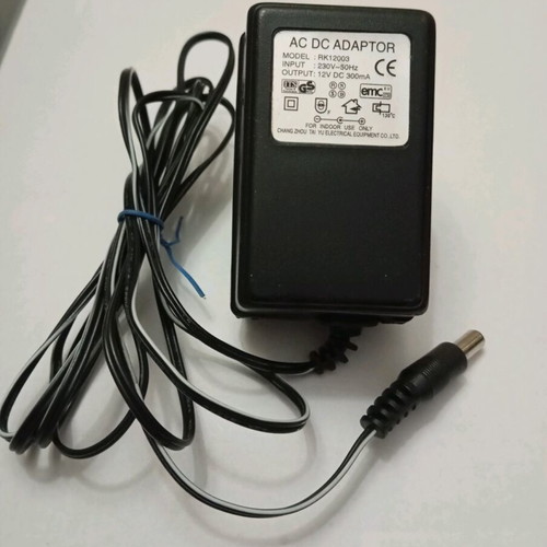 Power adapter 12V 300mA like new, model RK12003