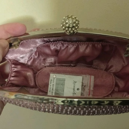 Accessorize pink clutch bag