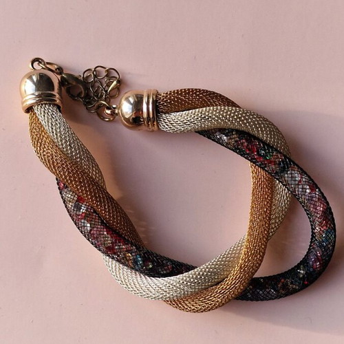 Bracelet like new with gold, silver and black net with beads