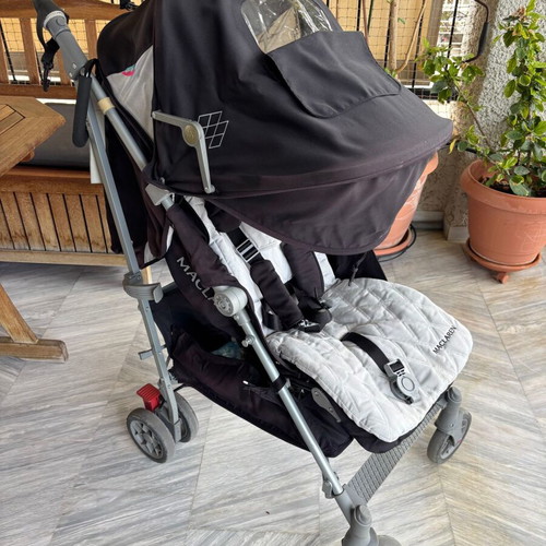 Maclaren Techno XLR stroller used with accessories and carrycot