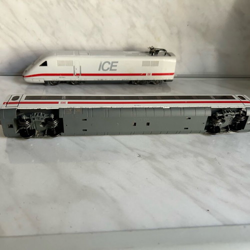 Marklin digital ICE HO train engine and one car used, for repair or parts