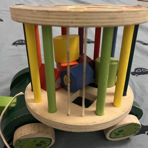 Wooden developmental toy with shapes, animals and colors like new