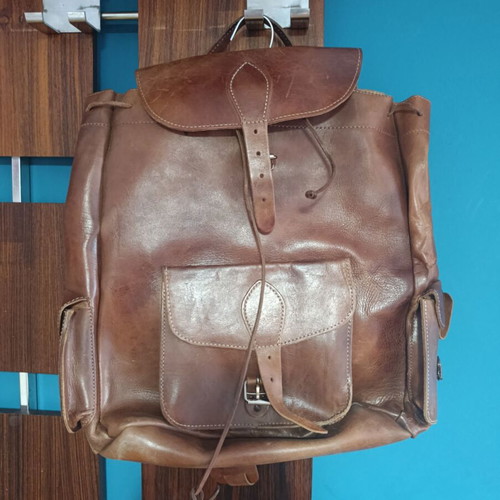 Vintage leather backpack like new, brown with three pockets