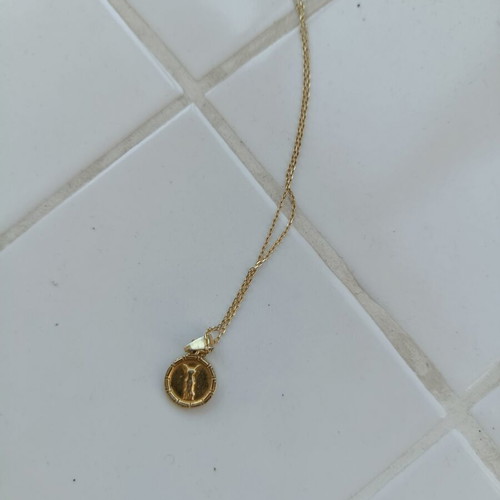 Gold-plated necklace with Nike of Samothrace pendant, like new