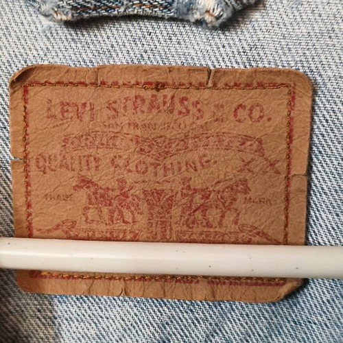 Levis jacket men's used, blue, size L with minor sleeve wear