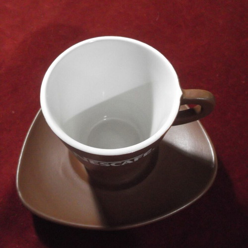 Nescafe collectible ceramic cup and saucer set like new