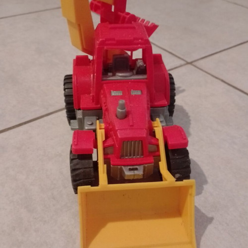 Beach toy set: plastic wheelbarrow, shovel, rake, small excavator