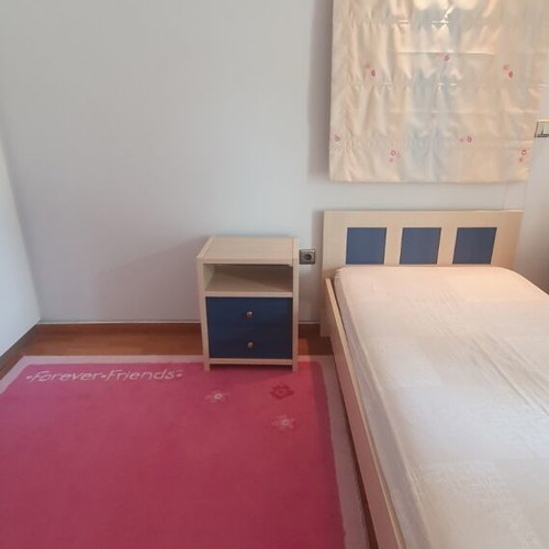 Blue bedroom set with desk, bookshelves and bed