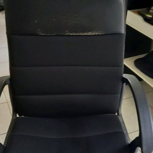 Black office chair with leatherette seat and backrest