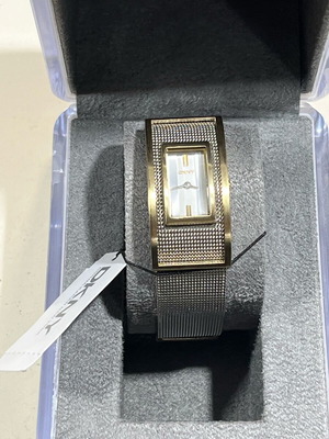 DKNY women's watch with silver double design bracelet