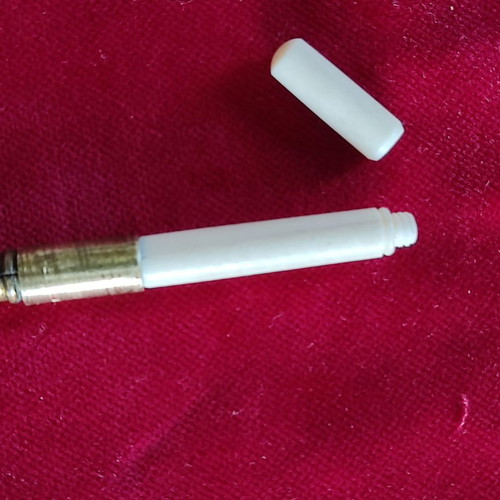 English brass magnifying glass for dressmakers used with hidden case