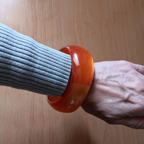 Acrylic bangle bracelet new, orange color