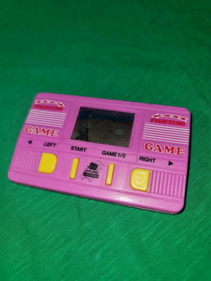Vintage electronic game missing battery cover screw and stand