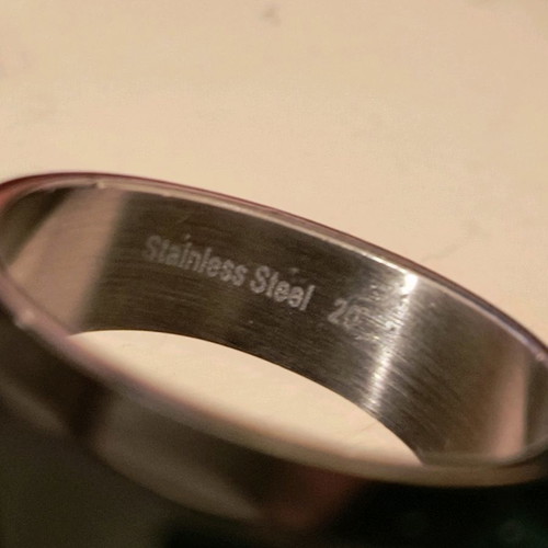 Steel ring used with green glass