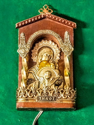 Vintage illuminated icon of Virgin Mary and Christ Child with lamp