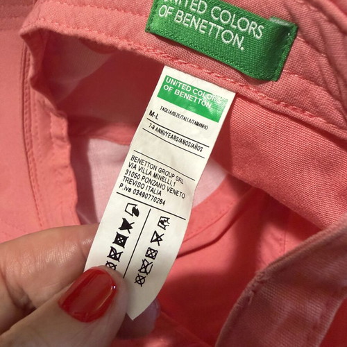 Benetton girls' hat coral size M-L like new