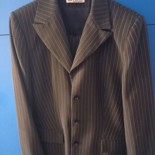 Elegant black suit with thin yellow stripes size 42 used by Lola