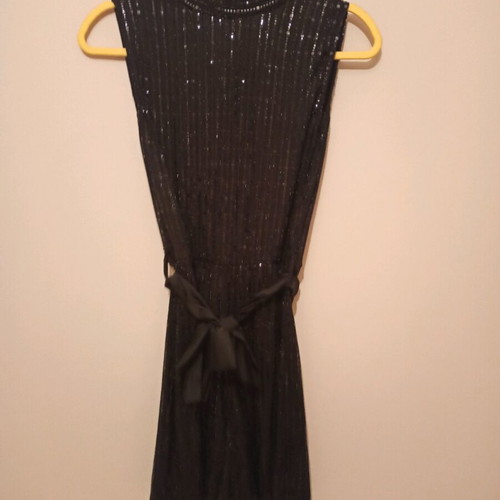 One-piece shortsuit used black with sequins S-M