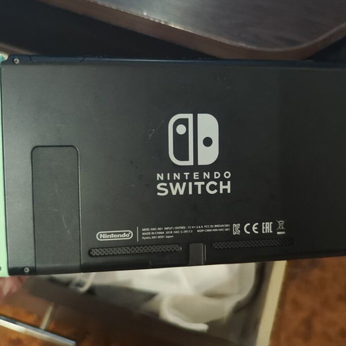 Nintendo Switch console with accessories, original controllers