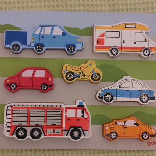 Wooden and paper puzzles used for children