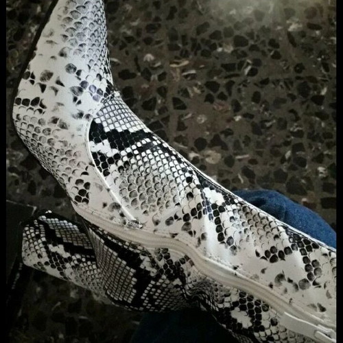 Boots spring snake skin design black and white like new