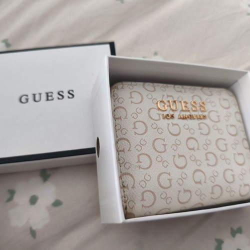 Guess wallet used, white and gold