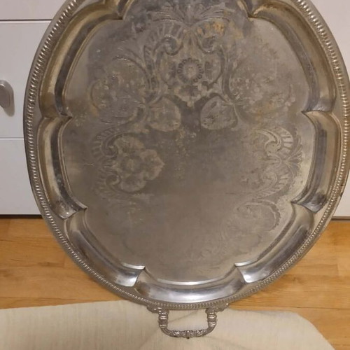 Silver-plated serving tray used with ornate handles