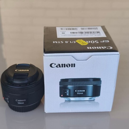 Canon EF 50mm f/1.8 STM lens with hood