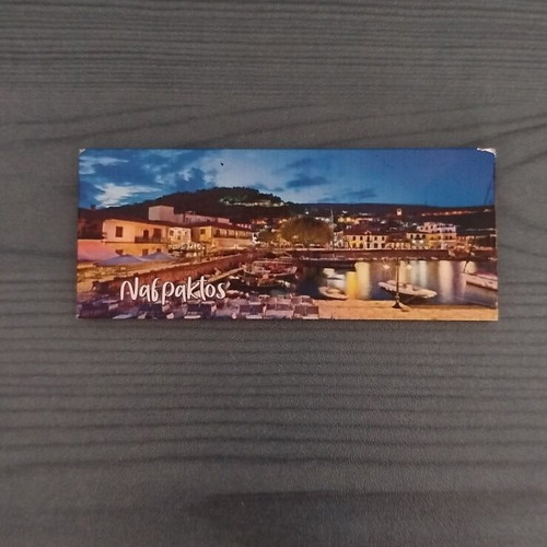 Set of 12 souvenir fridge magnets from various regions