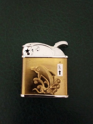 Lighter used with gas and silver-plated dolphin design